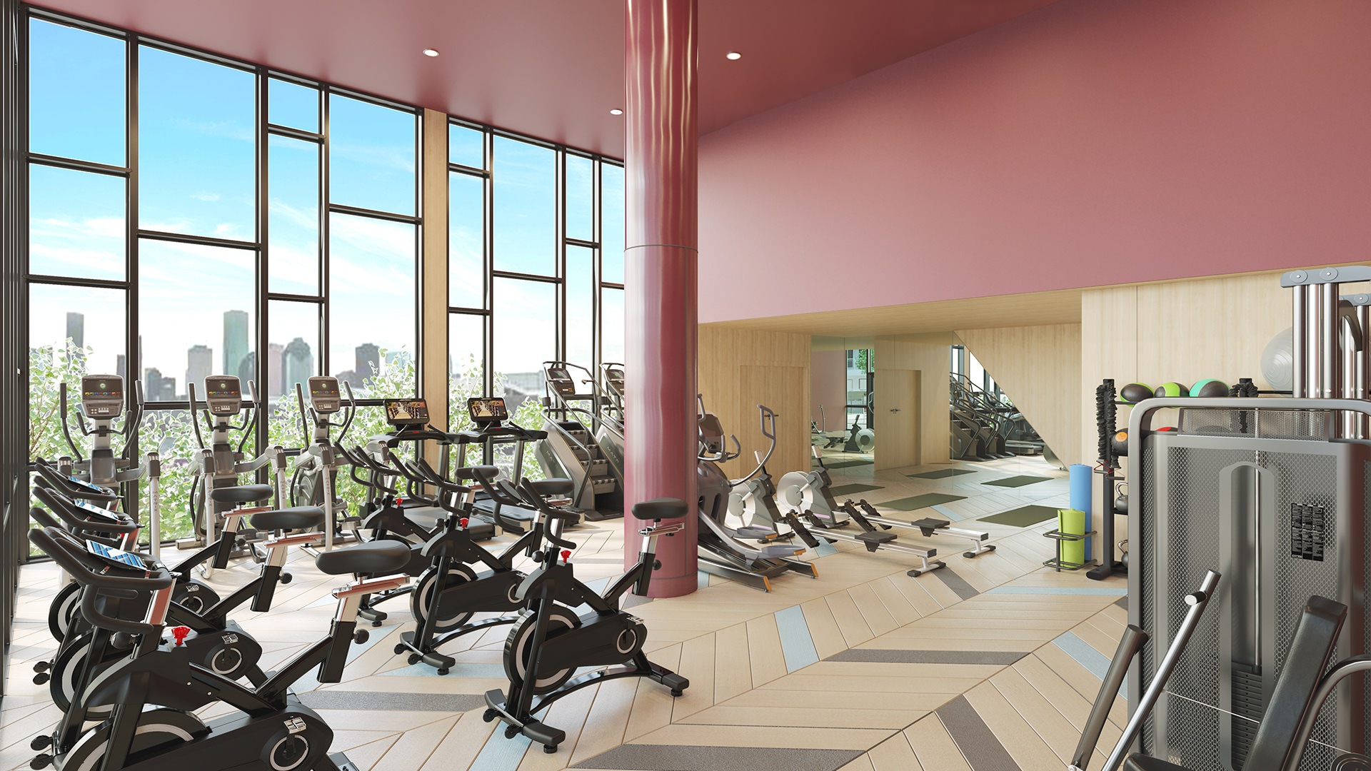 Large fitness center with wood floors and plenty of equipment